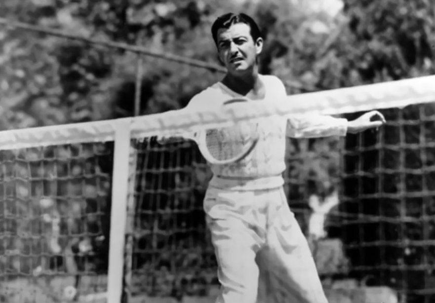Robert Taylor playing tennis