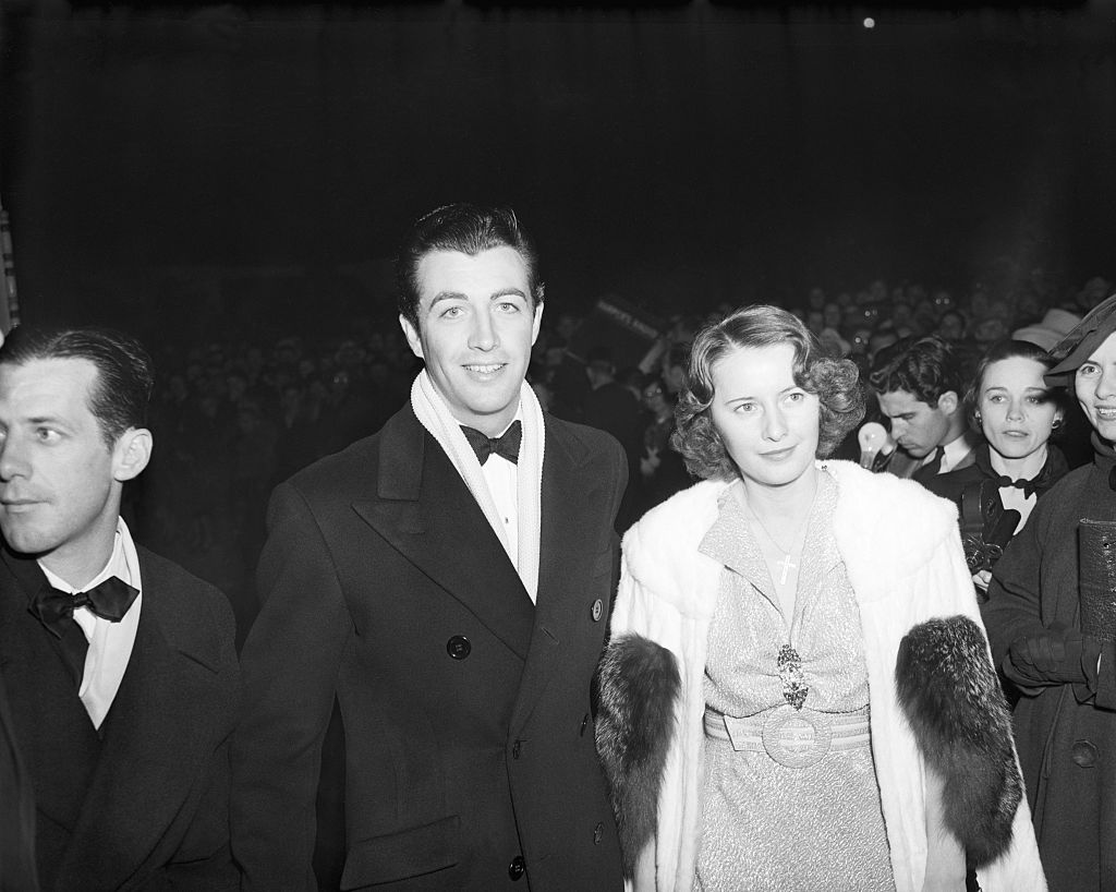 Robert Taylor and Barbara Stanwyck  at a movie premiere