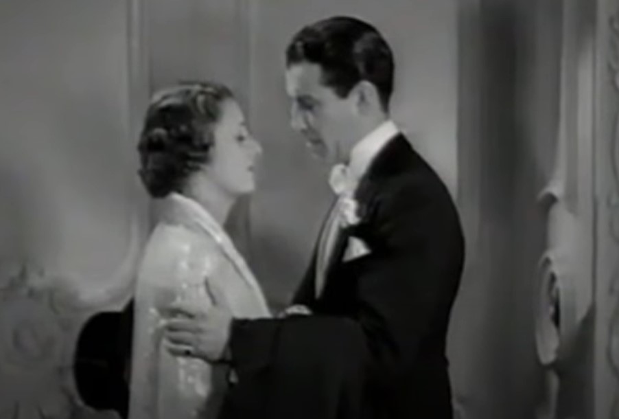 Robert Taylor in Magnificent Obsession in suit