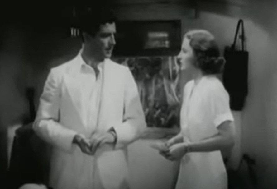 Barbara Stanwyck and Robert Taylor in His Brother's Wife, wearing white