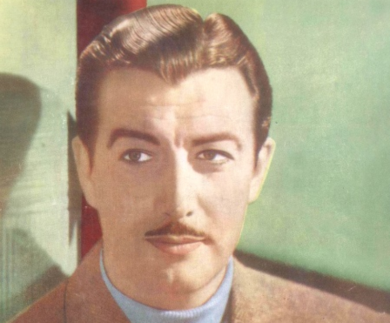 Robert Taylor in brown suit