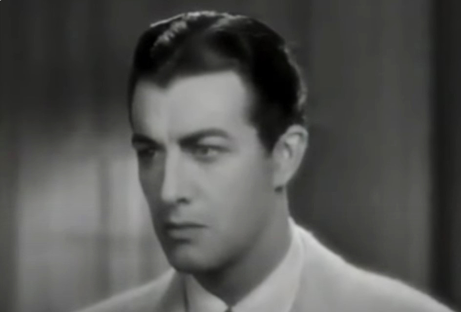 Robert Taylor in Magnificent Obsession in suit