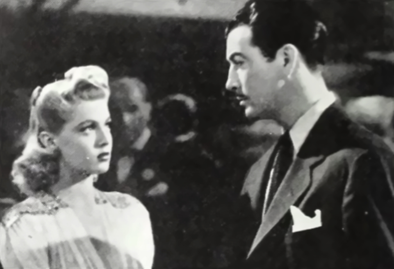 Lana Turner and Robert Taylor in Johnny Eager looking at each other