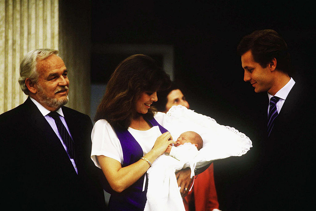 Prince Rainier III of Monaco poses for the birth of Princess Caroline's baby Andrea Casiraghi with Stefano Casiraghi outside the Princess Grace Hospital
