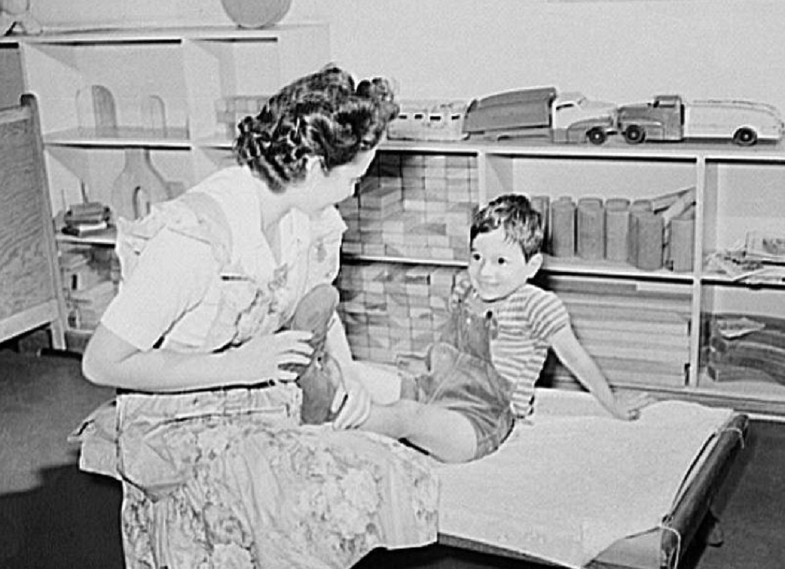 Dressing a child after nap - 1942