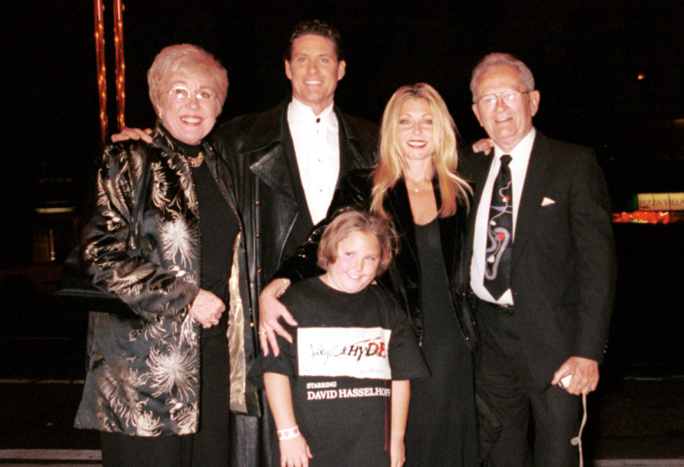 David Hasselhoff, center, and his family; wife Pamela Bach, second right, daughter Hayley Amber, center front, and parents, pose outside the Russian Tea Room