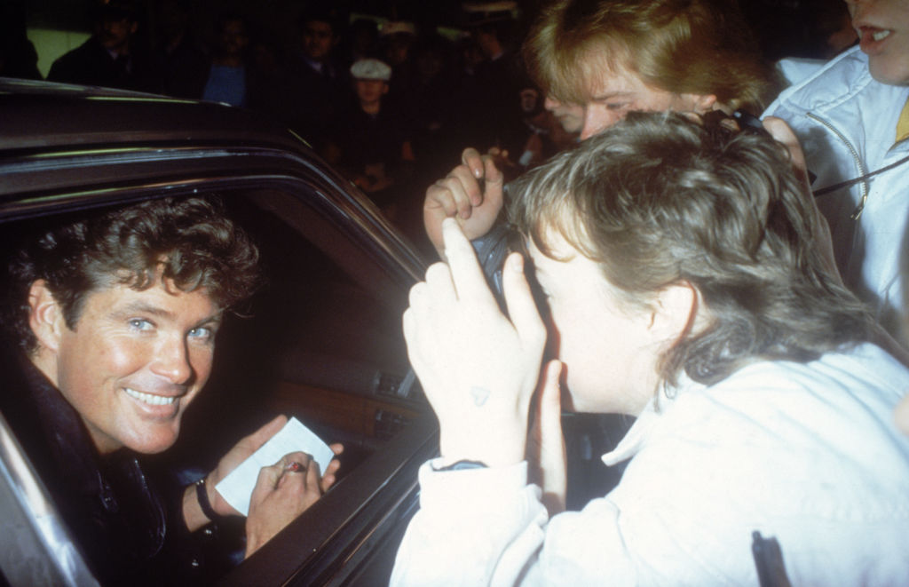American actor and singer David Hasselhoff, star of TV series 'Knight Rider' signing an autograph