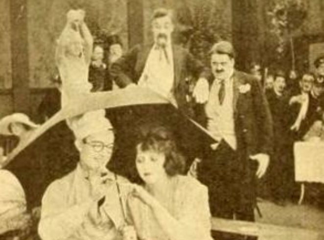 Still from the American comedy short film On the Fire (1919) with Bebe Daniels, Harold Lloyd