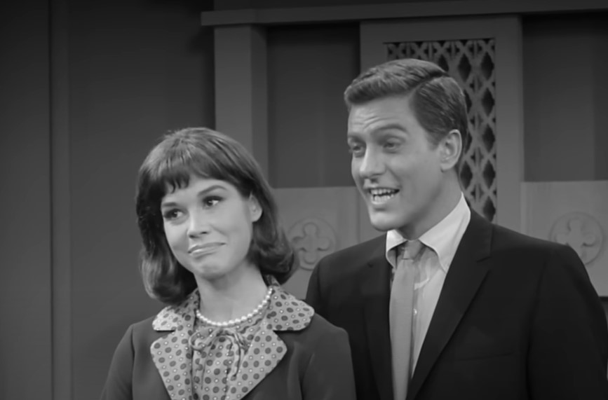 Mary Tyler Moore  in  Dick Van Dyke Show with Dick Van Dyke  speaking to someone