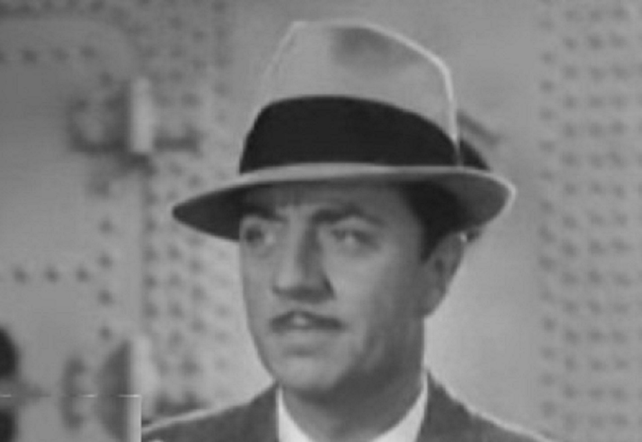 Cropped screenshot of William Powell from the trailer for the film Libeled Lady (1936).