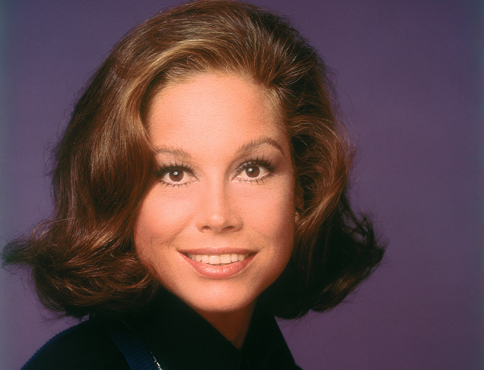 Close-up of smiling actress Mary Tyler Moore who stars in the television series The Mary Tyler Moore Show, circa 1975