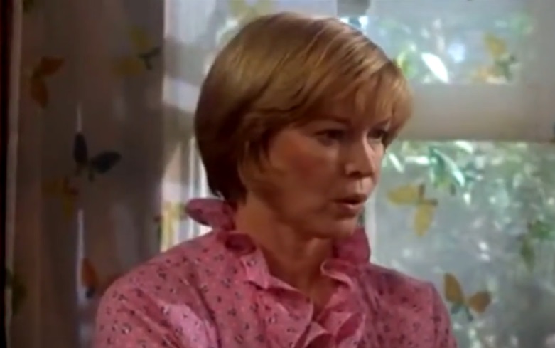 Portrait Photo of the American Actress Ellen Burstyn from the movie Alice Doesn't Live Here Anymore, wearing gray outfit