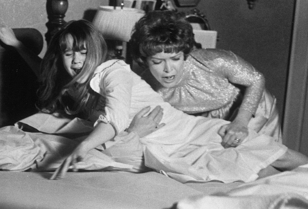 Grayscale Photo of Actresses Linda Blair and Ellen Burstyn in Movie The Exorcist