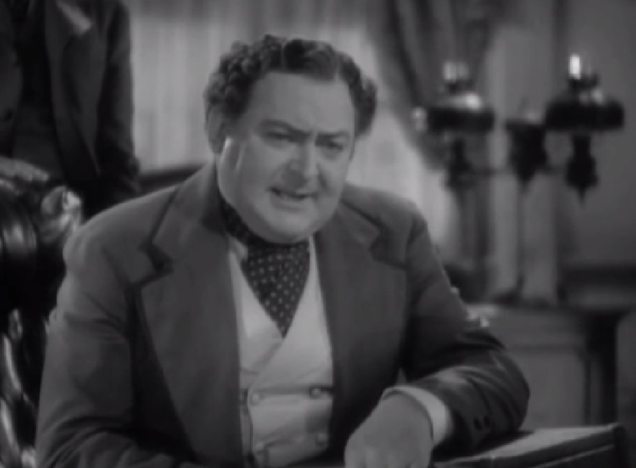 Screenshot of James Fisk (Edward Arnold) looking at side - from The Toast of New York (1937)