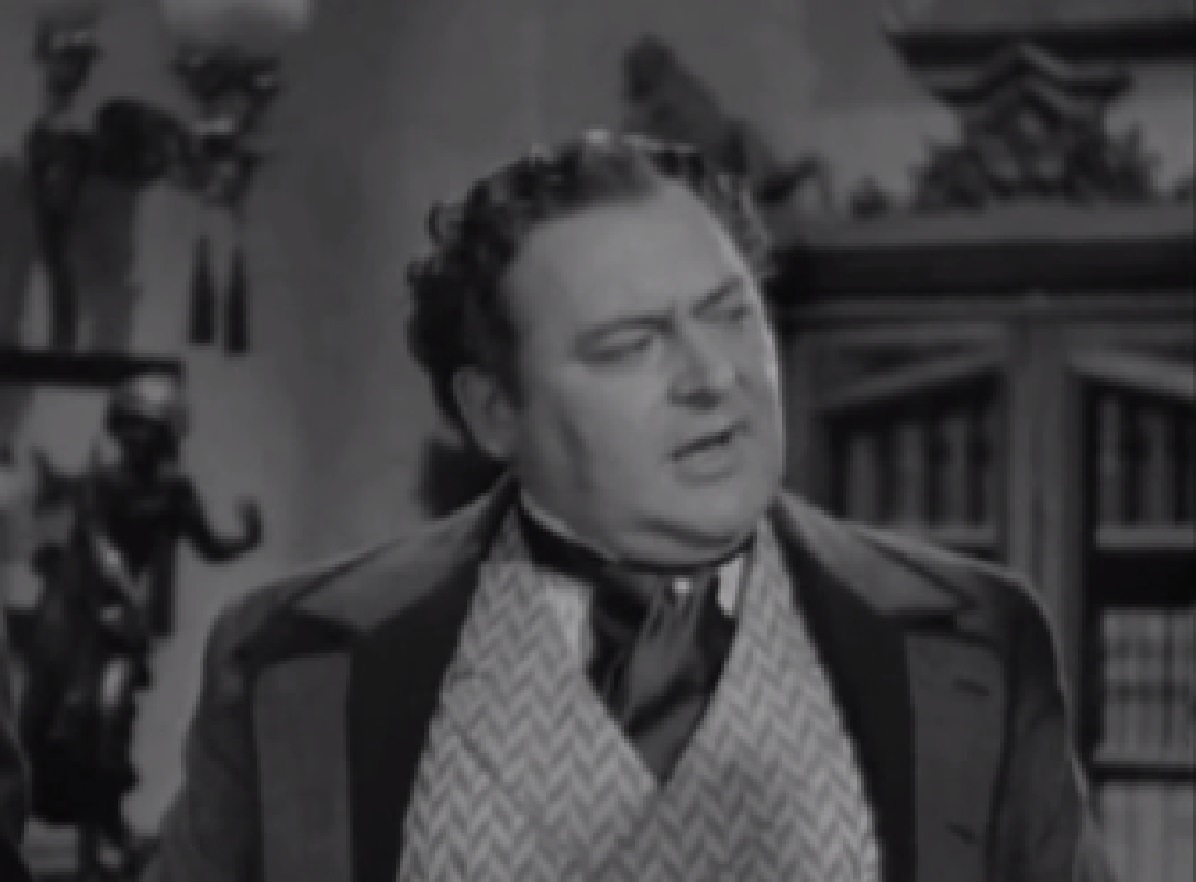 Screenshot of James Fisk (Edward Arnold) looking upset at side - from The Toast of New York (1937)