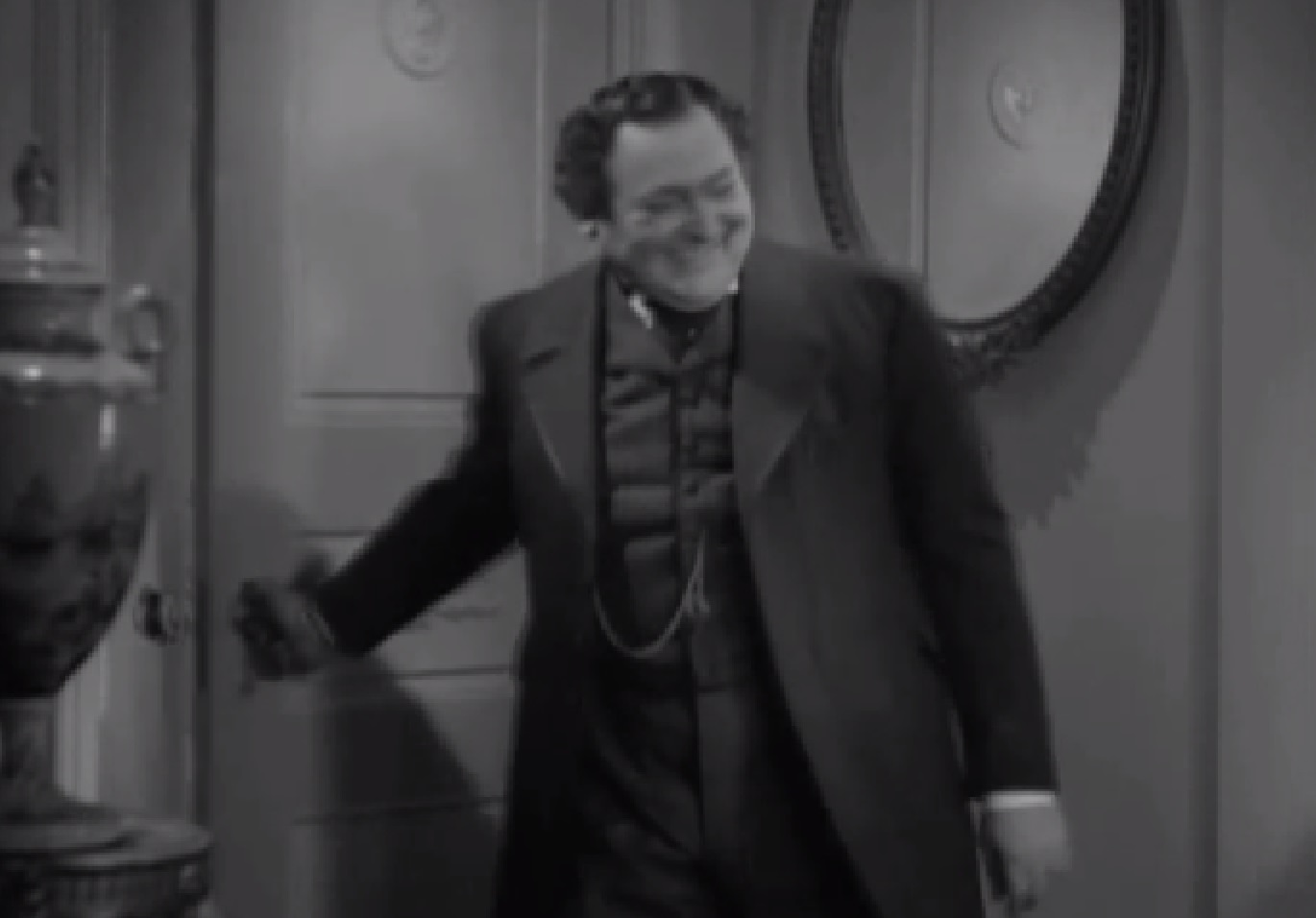 Screenshot of James Fisk (Edward Arnold) entering in room - from The Toast of New York (1937)