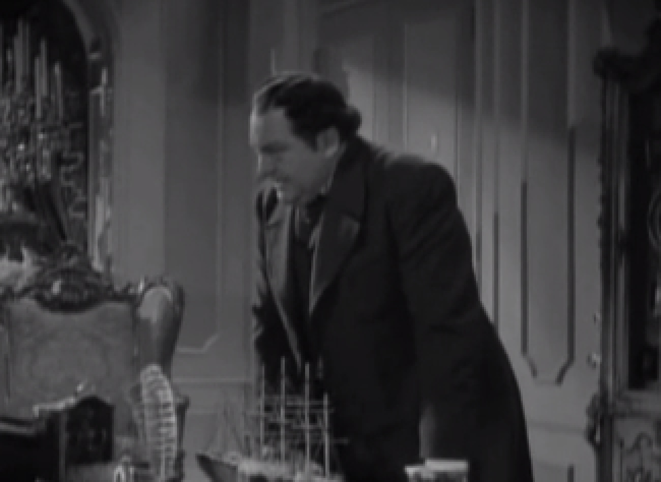 Screenshot of James Fisk (Edward Arnold) looking at front upset - from The Toast of New York (1937)