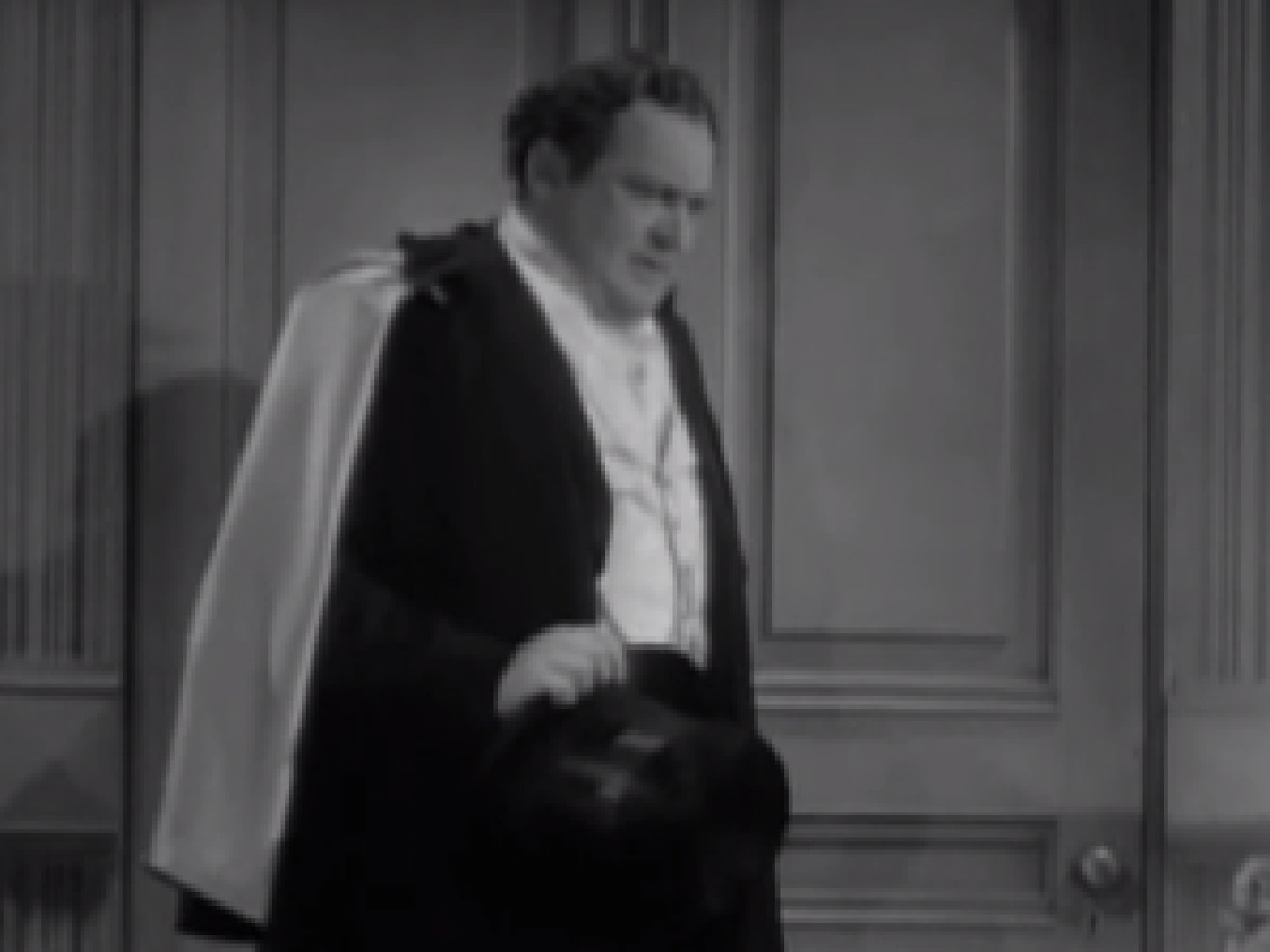 Screenshot of James Fisk (Edward Arnold) wearing suit and looking at side - from The Toast of New York (1937)