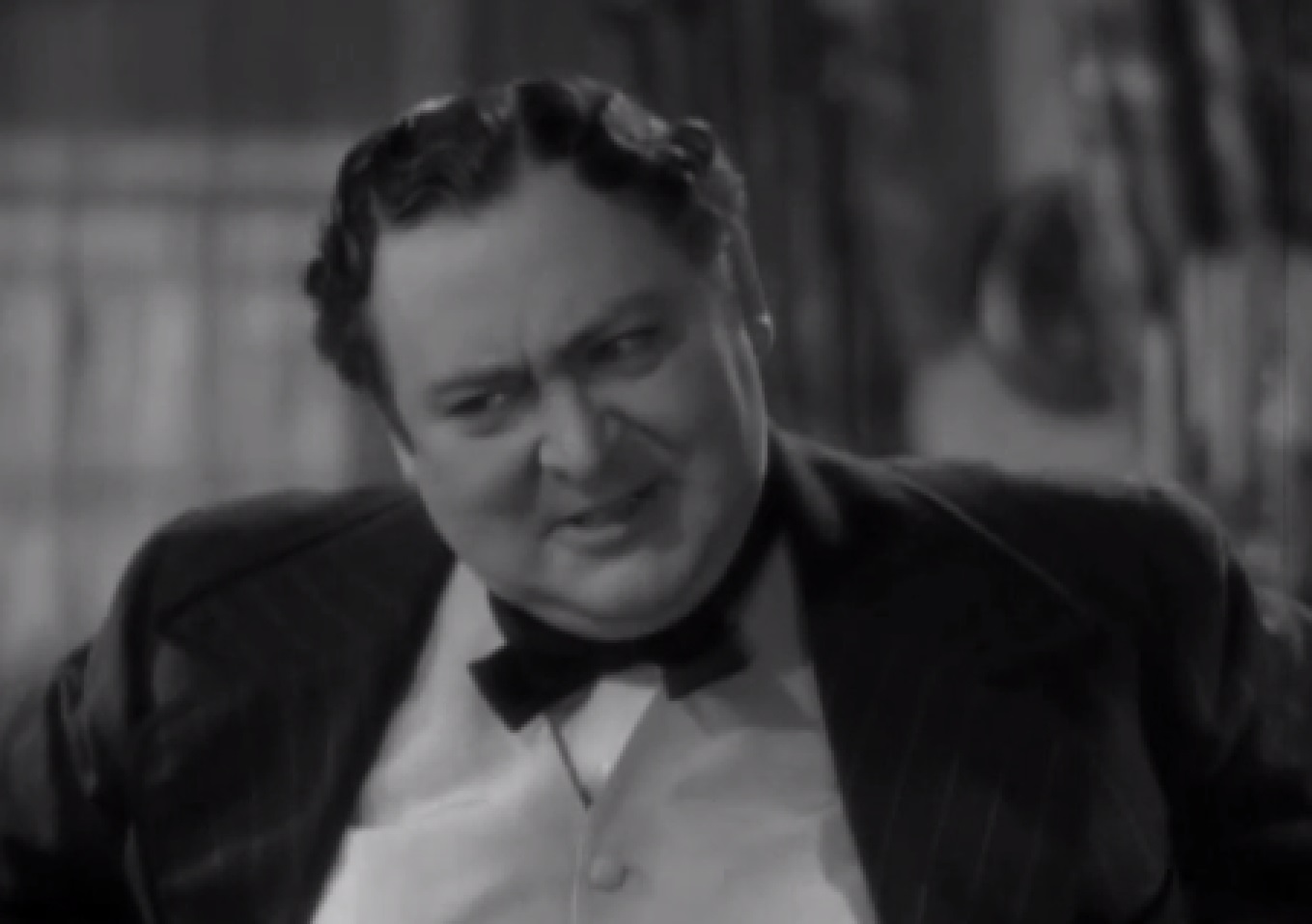 Screenshot of James Fisk (Edward Arnold) looking upset - from The Toast of New York (1937)