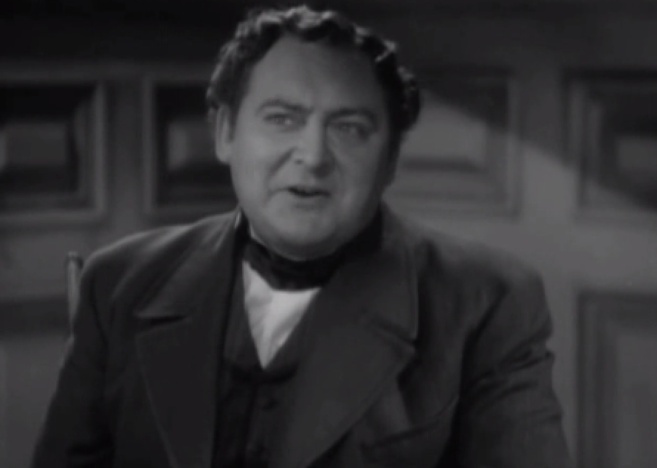 Screenshot of James Fisk (Edward Arnold) looking at front - from The Toast of New York (1937)