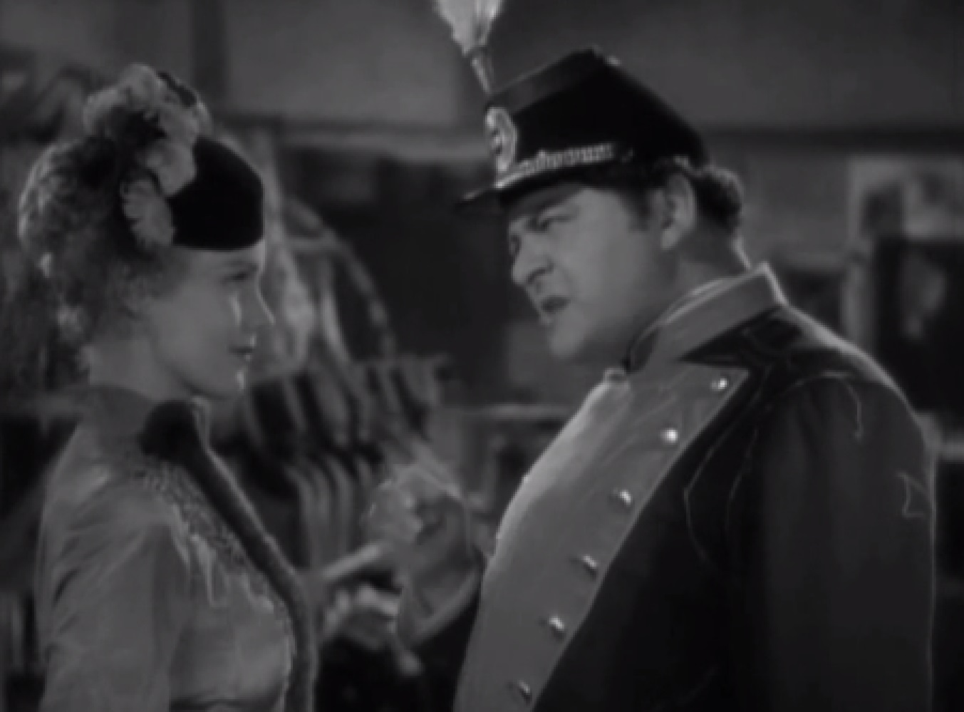 Screenshot of James Fisk (Edward Arnold) and Fleurique (Thelma Leeds) talking - from The Toast of New York (1937)