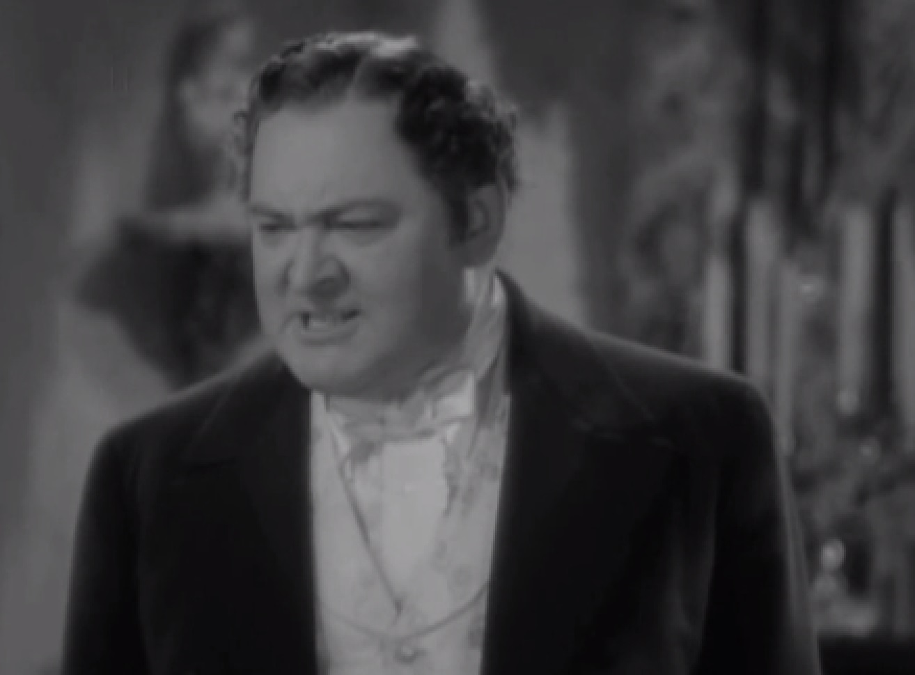 Screenshot of James Fisk (Edward Arnold) looking upset - from The Toast of New York (1937)
