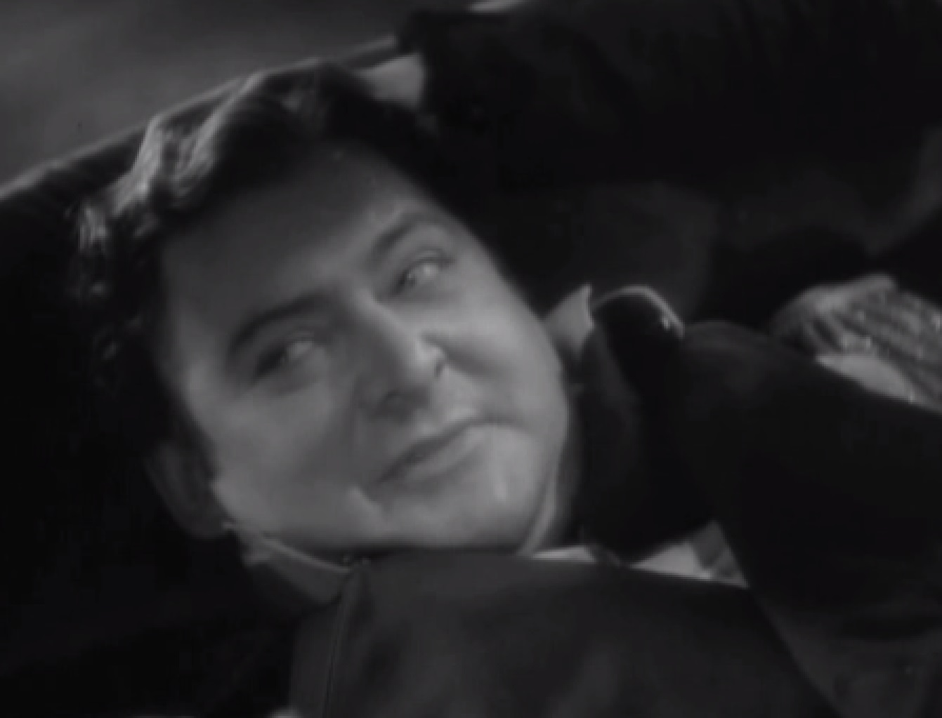 Screenshot of James Fisk (Edward Arnold) laying and looking at side - from The Toast of New York (1937)