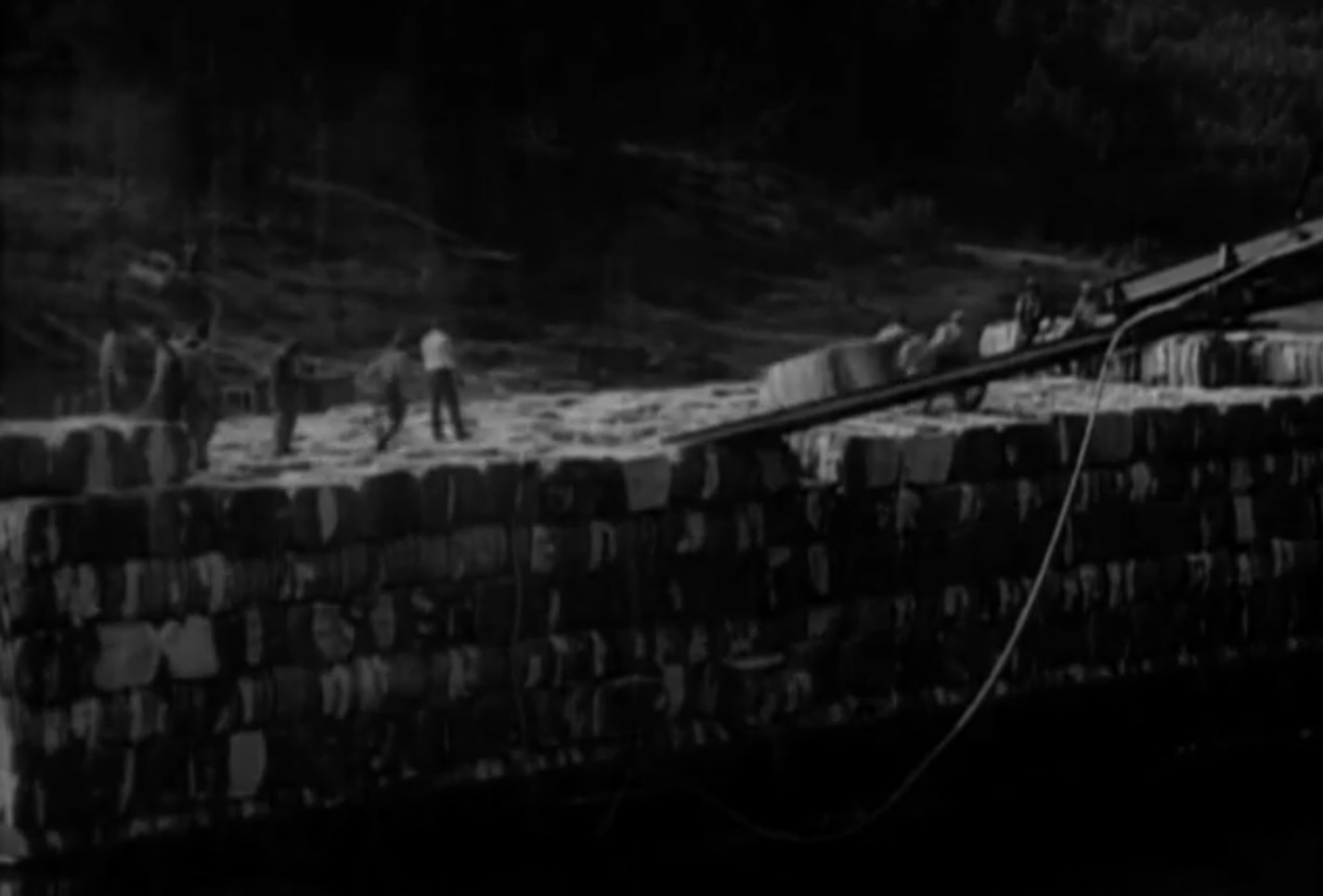 Screenshot of cotton blocks on the ship - from The Toast of New York (1937)