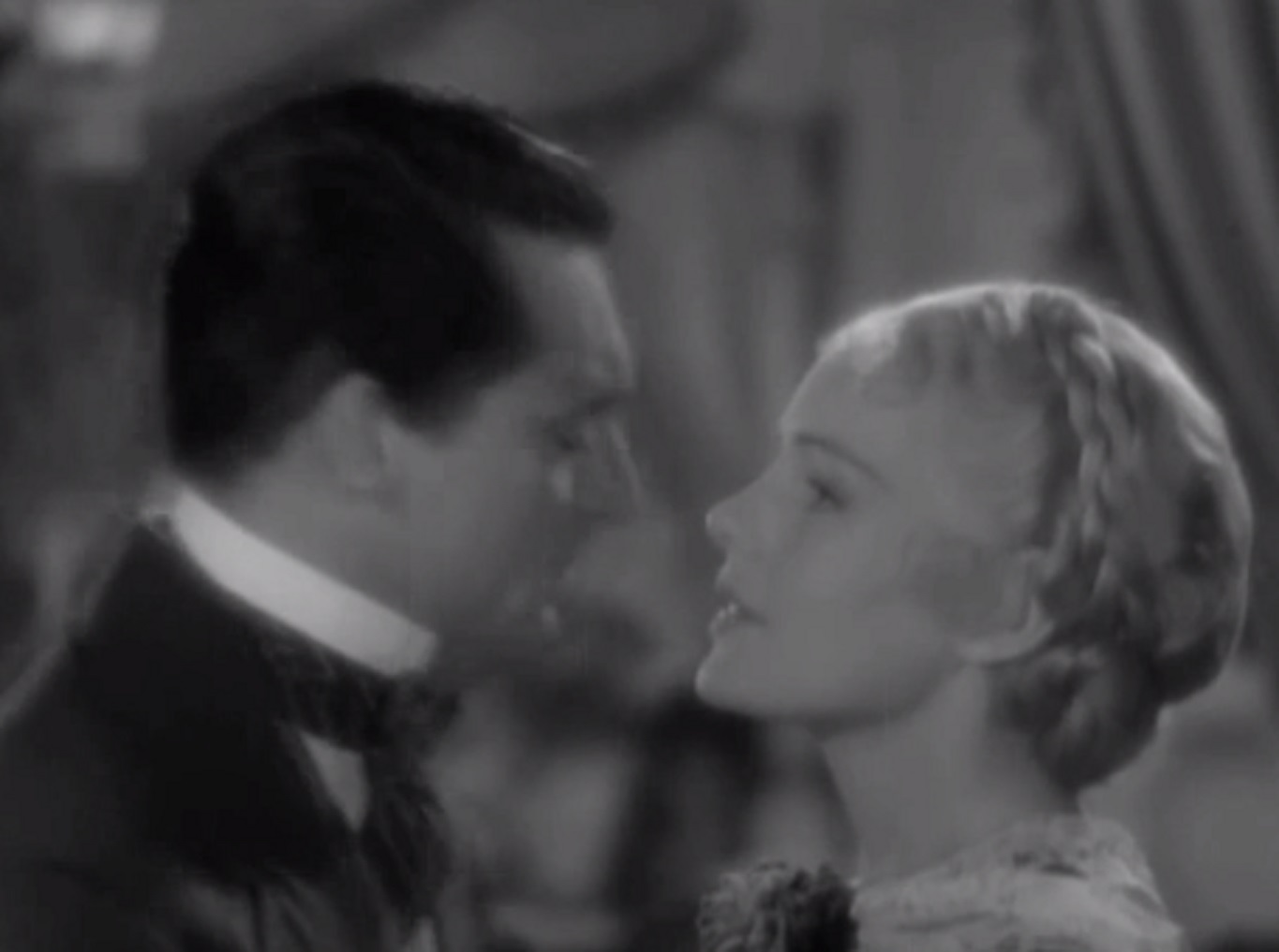 Screenshot of Fleurique (Thelma Leeds) talking to man - from The Toast of New York (1937)