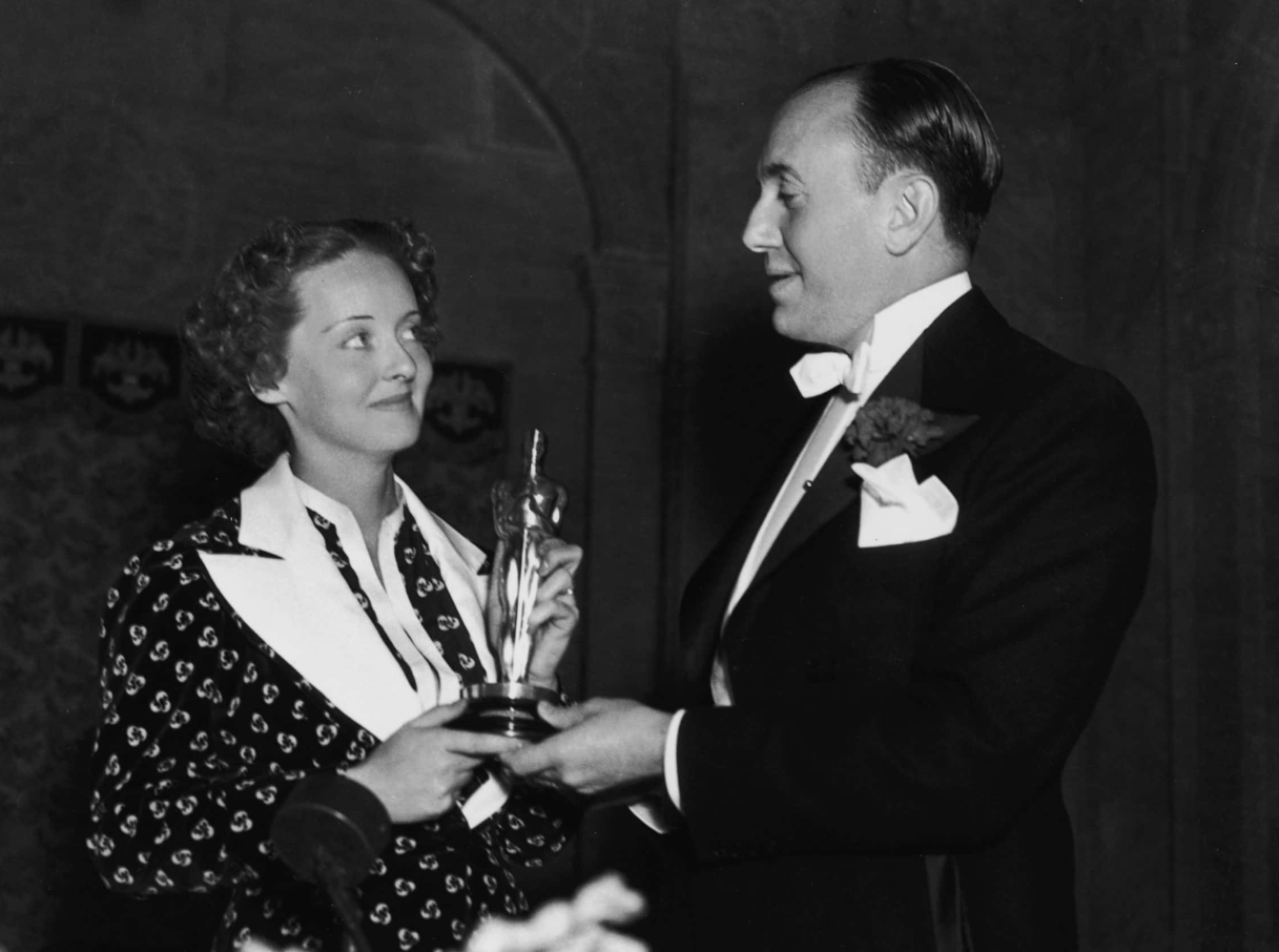 Davis And Warner Hold Davis' Best Actress Oscar