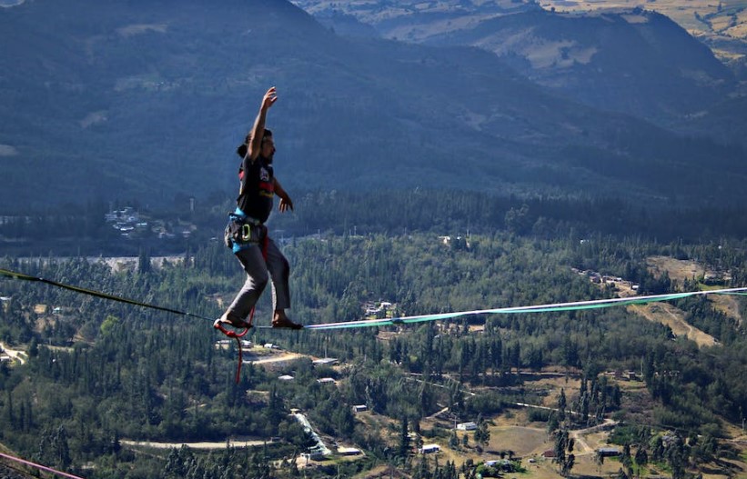 Man walking on a rope , Slacklining
