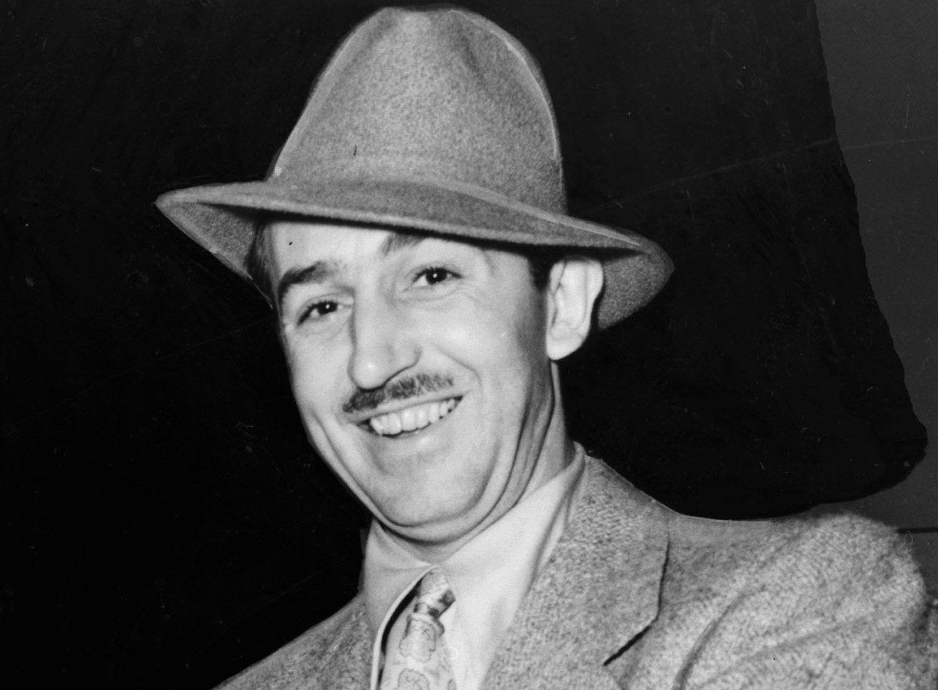 Walt Disney wearing a hat