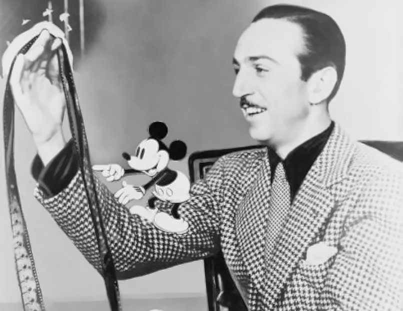 Walt Disney with film roll
