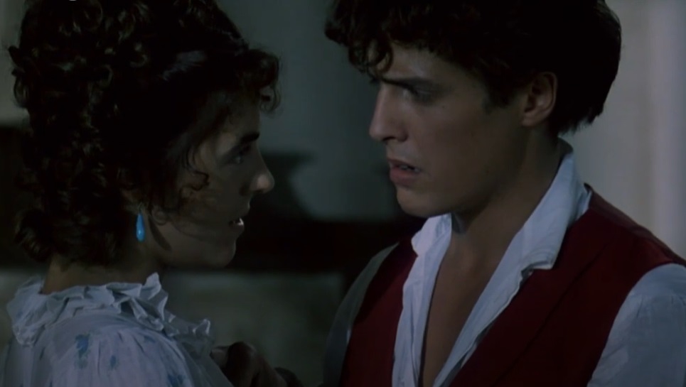 Screenshot from the movie Rowing with the Wind, actress Elizabeth Hurley portraying Claire Clairmont and actor Hugh Grant portraying Lord Byron