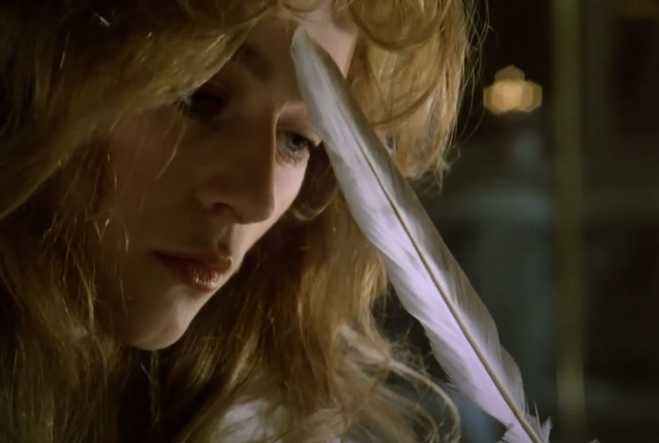Portrait Photo of the Actress Lizzy McInnerny as Mary Shelley from the movie Rowing with the Wind, holding a feather