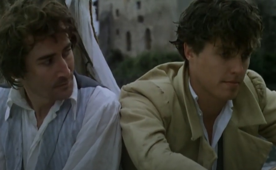 Screenshot from the movie Rowing with the Wind, actors Valentine Pelka portraying Percy Bysshe Shelley and Hugh Grant as Lord Byron