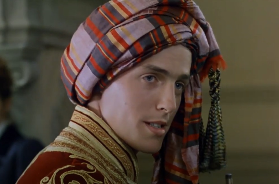 Screenshot from the movie Rowing with the Wind, actor Hugh Grant as Lord Byron