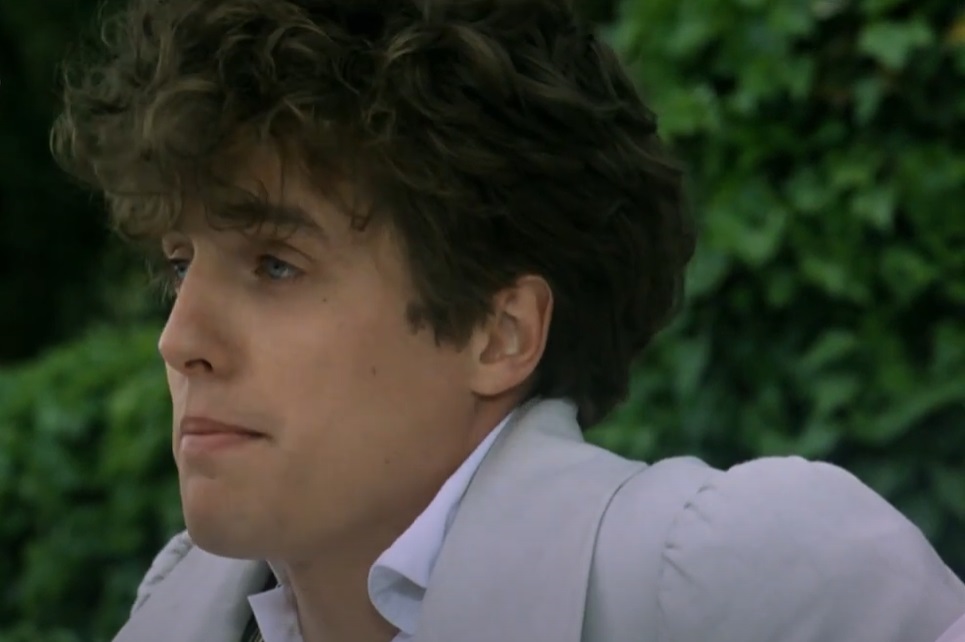 Screenshot from the movie Rowing with the Wind, actor Hugh Grant as Lord Byron