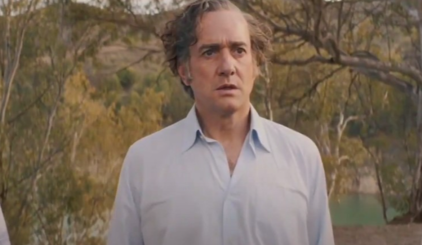 Matthew Macfadyen as John Stonehouse in beige suit