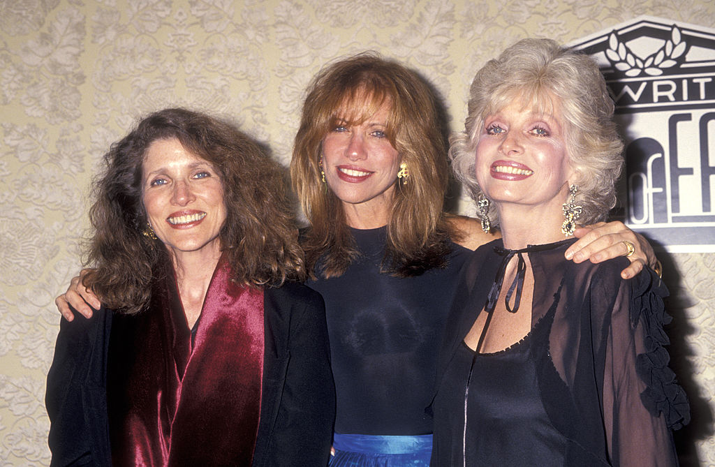 Musician Carly Simon and sisters Lucy Simon and Joanna Simon