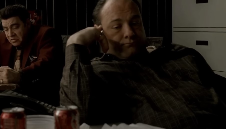 James Gandolfini as Tony Soprano and a cast member