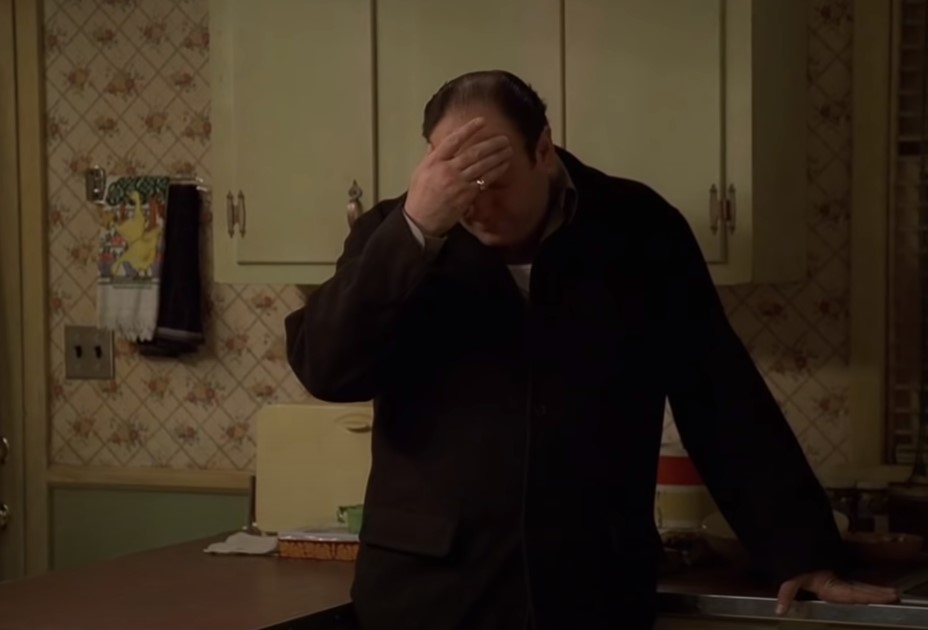 James Gandolfini as Tony Soprano holding his head 