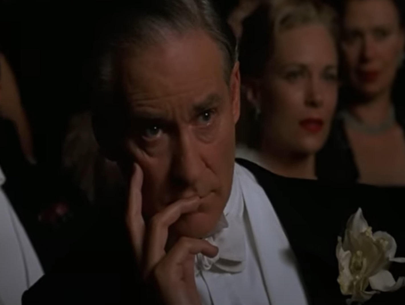 Screenshot of Cole Porter (Kevin Kline) wearing suit is looking sad - from De-Lovely (2004)