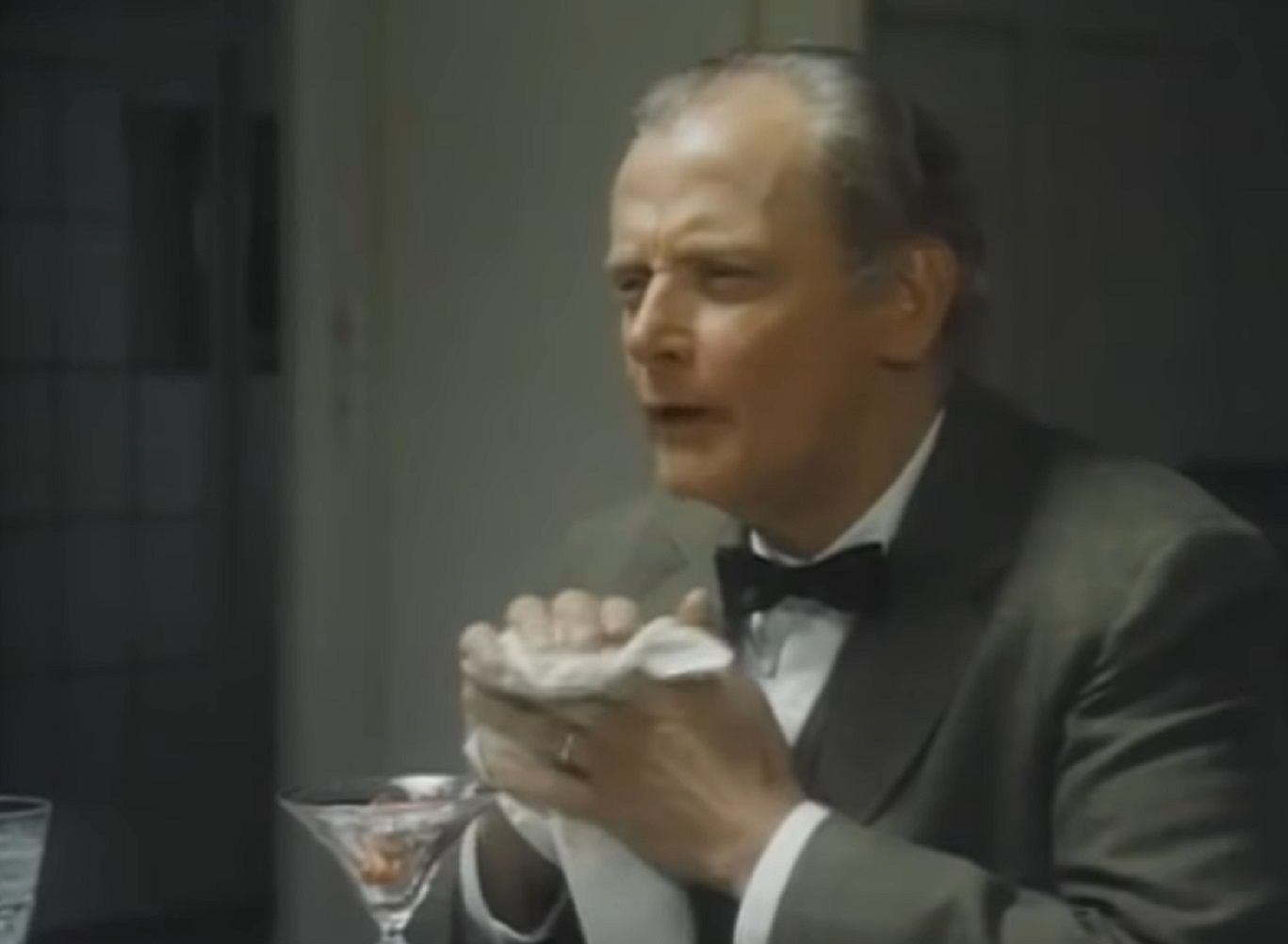 Screenshot of Art Carney wearing suit and talking - from Katherine (1975)