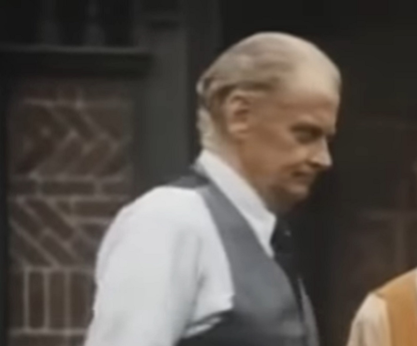 Screenshot of Art Carney wearing white shirt and west looking at front - from Katherine (1975)