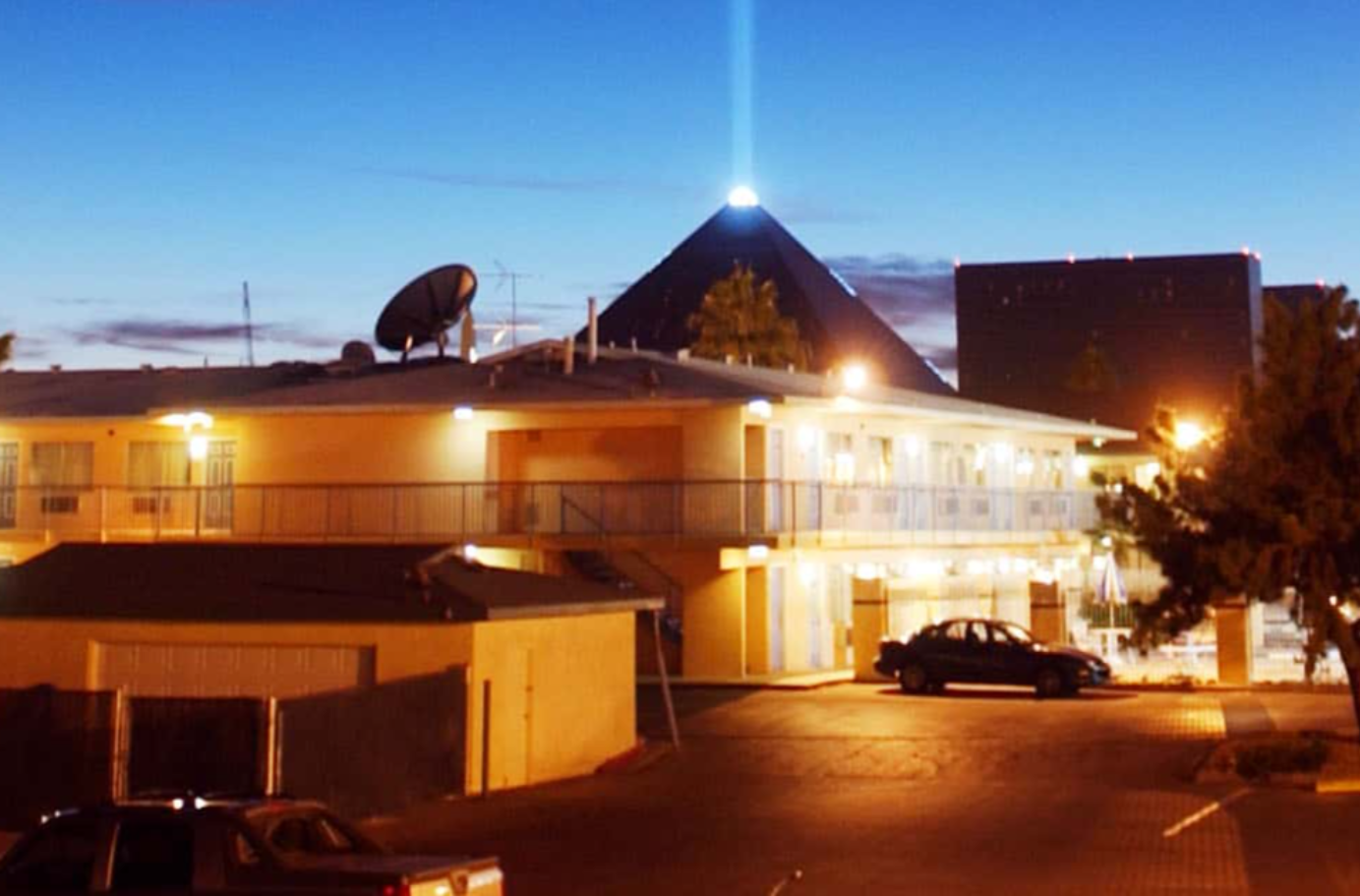 The Egyptian pyramid-shaped Luxor Hotel's light beam dominates the sky above the many hotels on or near the Las Vegas Strip