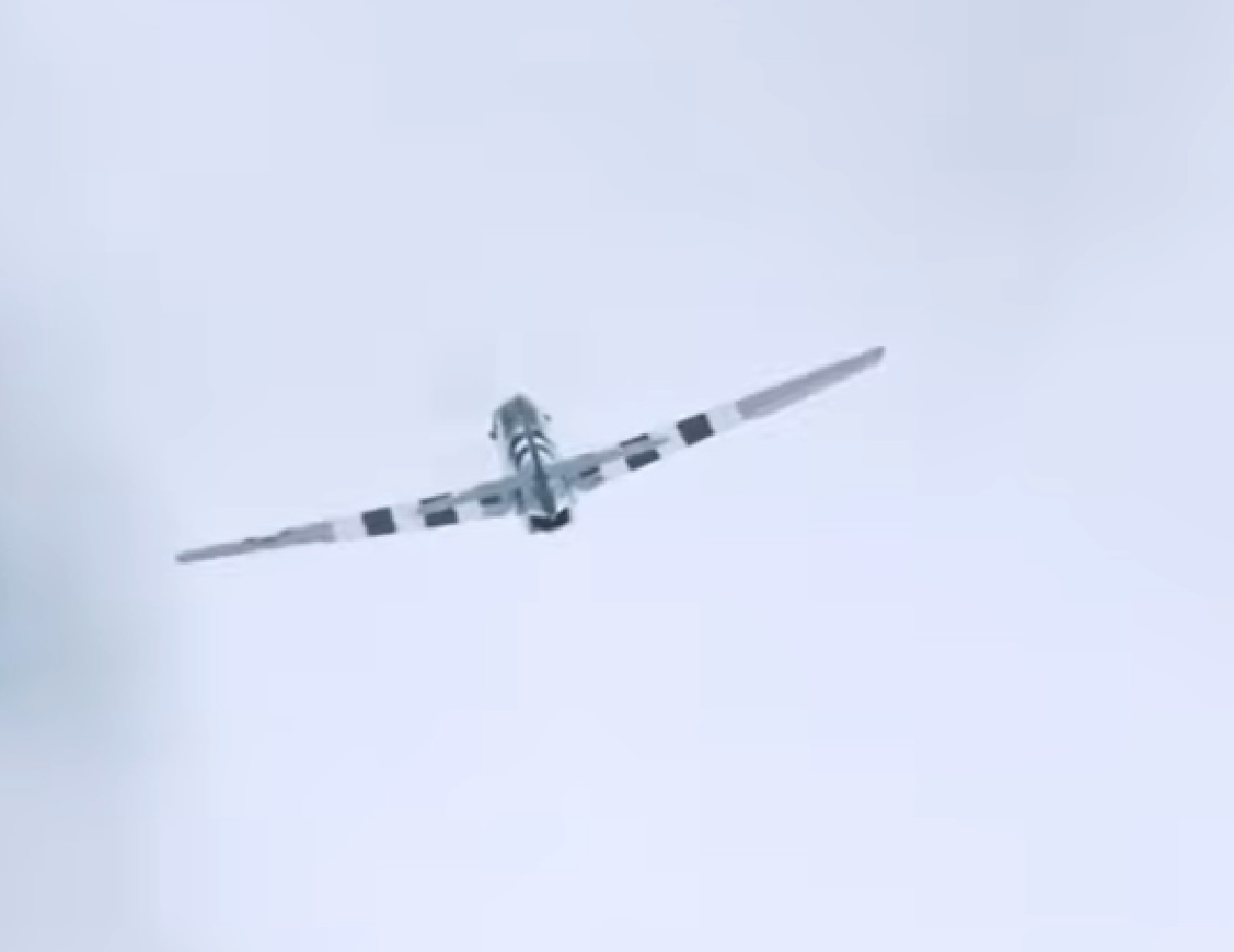 Screenshot of plane on the sky - from Saving Private Ryan (1998)