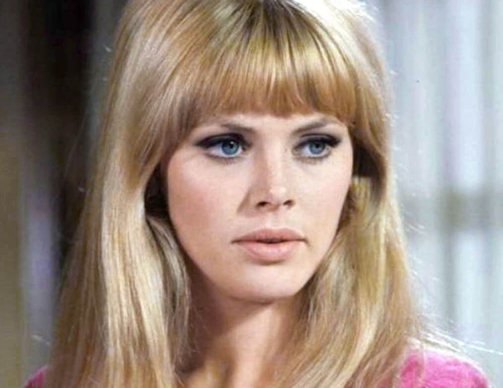 Britt Ekland in pink top