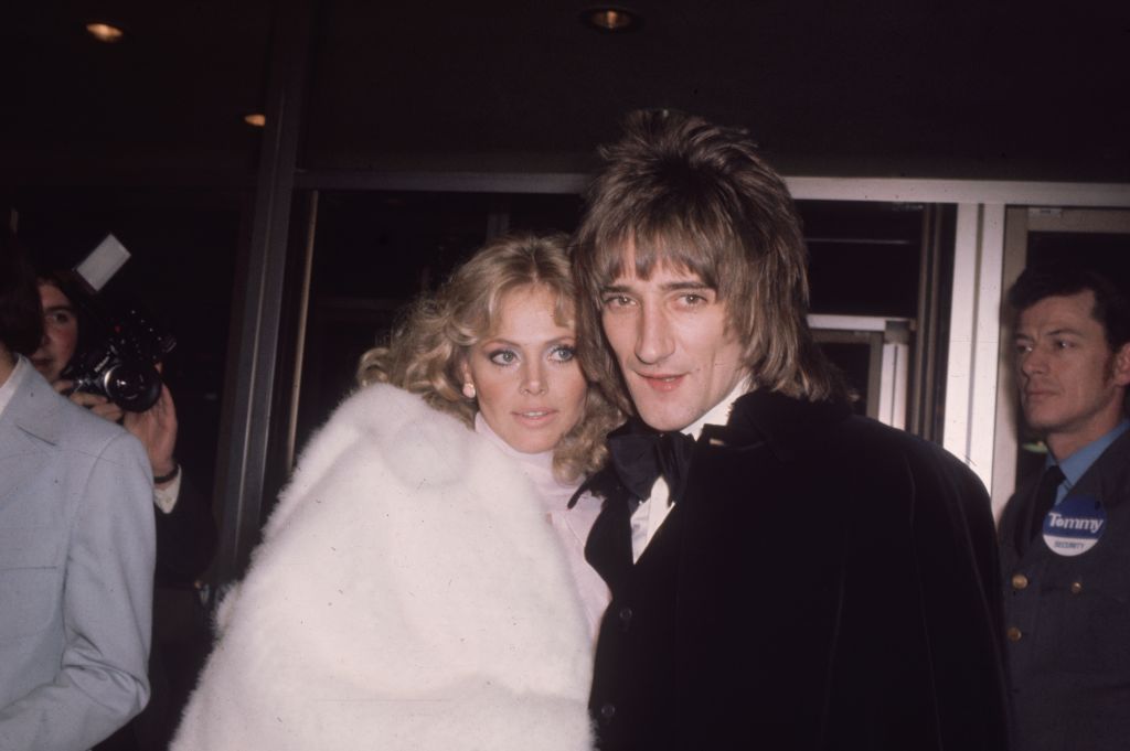 Rock star Rod Stewart with girl friend, film star Britt Ekland at an event