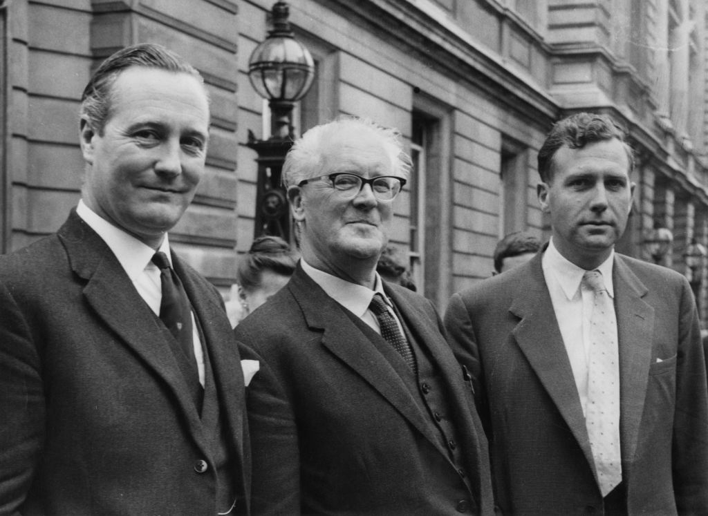 John Stonehouse in suit and members of parliament